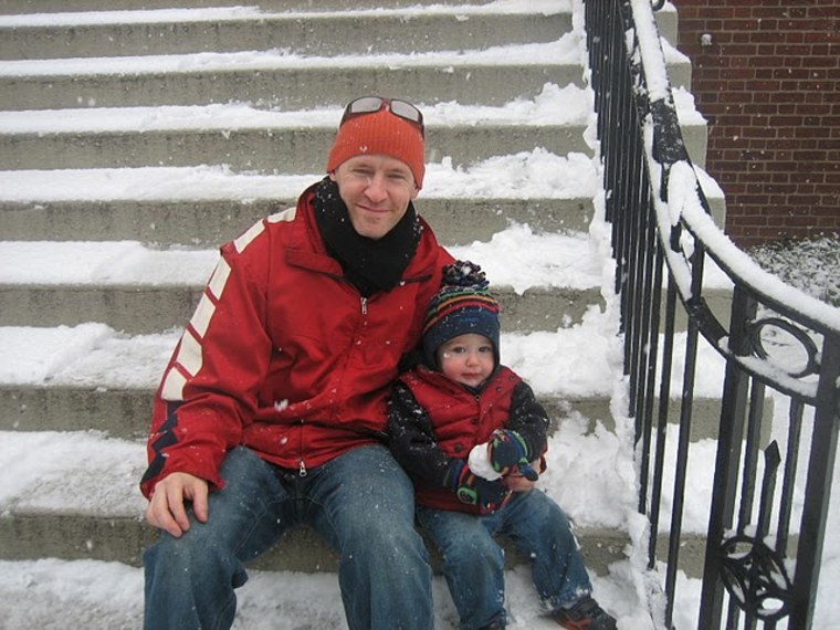 Jason Chupick and his son Henry, 2, play in the snow. Chupick works three days a week in order to spend more time with his son.